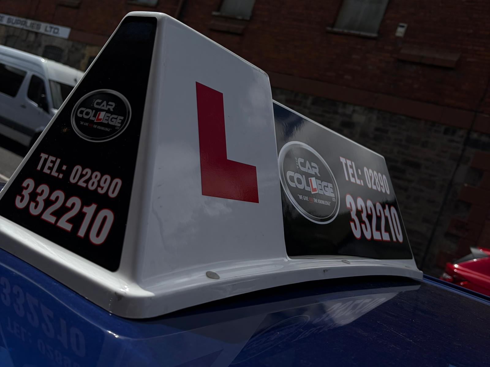 Learner driving lesson on the road