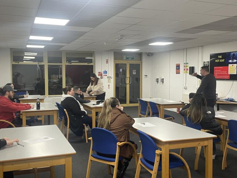 Instructor leading a classroom training session